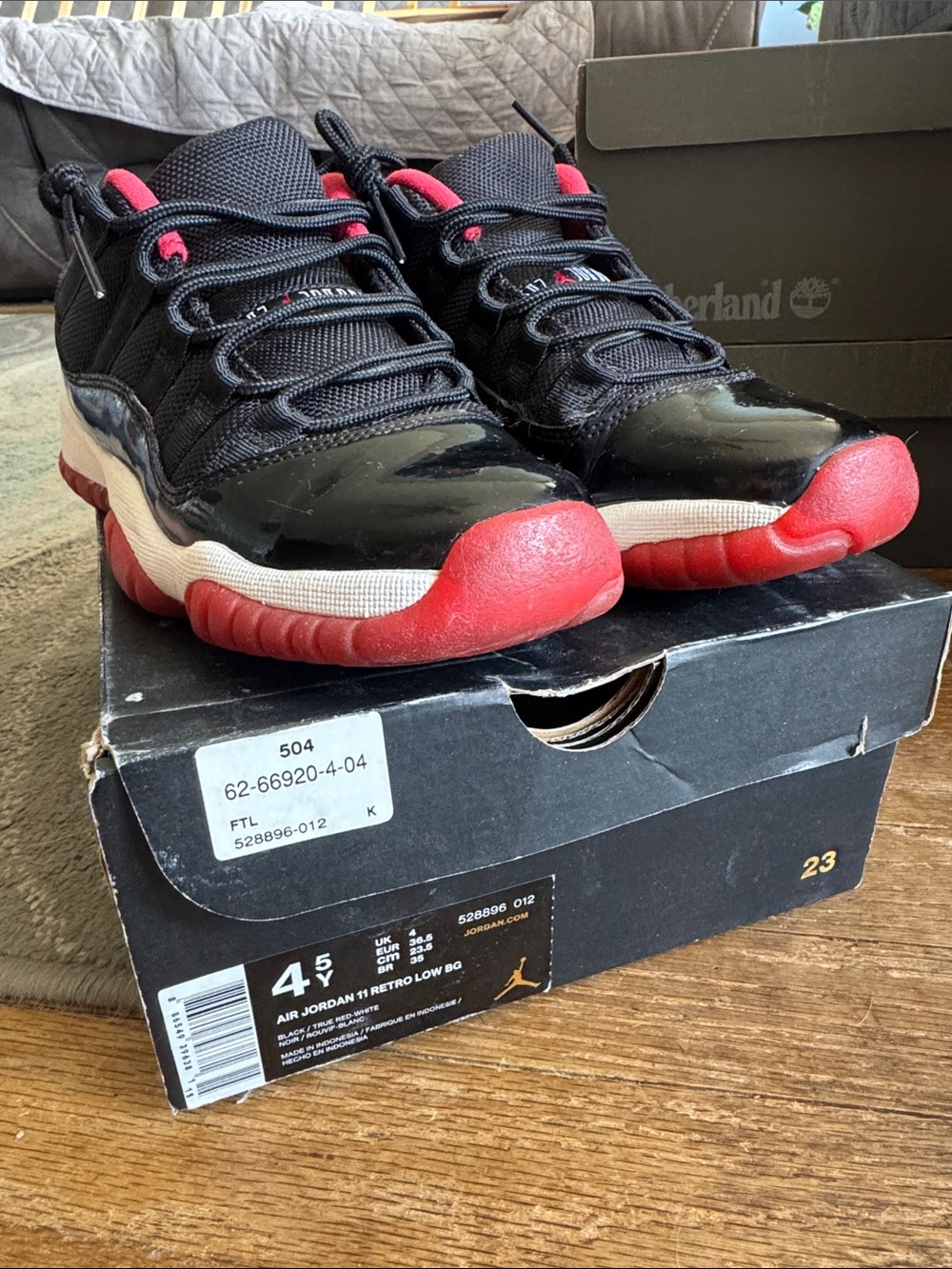 Nike Air Jordan 11 Retro Low Black and Red Sneakers